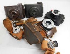 A group of miniature camera's: to include Eljy Lumiere in leather case; a Walter Kunik Petie Sub