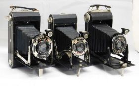 Three Kodak camera's: to include a Kodak Sx-20 Model C Folding camera; a Kodak Six-20 folding camera