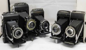 Five Kodak cameras: to include a Kodak Vigilant Six-20; a Kodak Monitor Six-16; a Kodak Vollenda