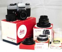 Leica: to include a Leicaflex SL camera,c.1966, serial no.1153184, boxed with guarentee card and