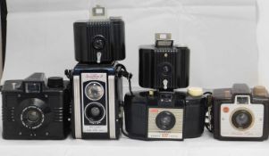 A mixed lot of camera's: to include a Kodak Duaflex II; an Iford Envoy; a Kodak Brownie 127; a Kodak