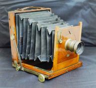 A J Lizar's 'Challenge' camera, mahogany cased with unmarked brass f/8 lens