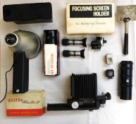 A mixed lot of camera accessories: to include a Leitz Wetzlar camera bellows no.9649; a Corfield