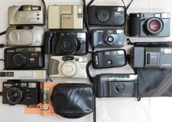 A quantity of assorted modern compact camera's: to include Olympus, Yashica, Canon, Konica,