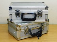 A pair of hard shell aluminum camera cases, approx. 34 x 22 x 14cm, (empty)
