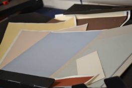 A folder of assorted artists card and coloured papers, assorted sizes