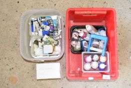 Two boxes of acrylic paints