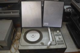 A Braun portable record player with speakers