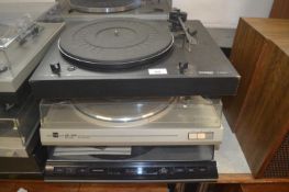 A group of three turntables comprising a Dual CS514 Belt Drive, a Hark Sound HS910 and Thorens TD280