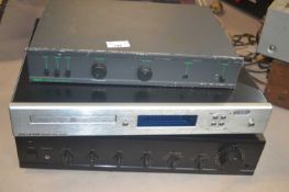 A group of stereo separates comprising a QED A230 stereo amplifier, an Evolution CD player and a