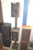 A pair of Arkam speakers with stands