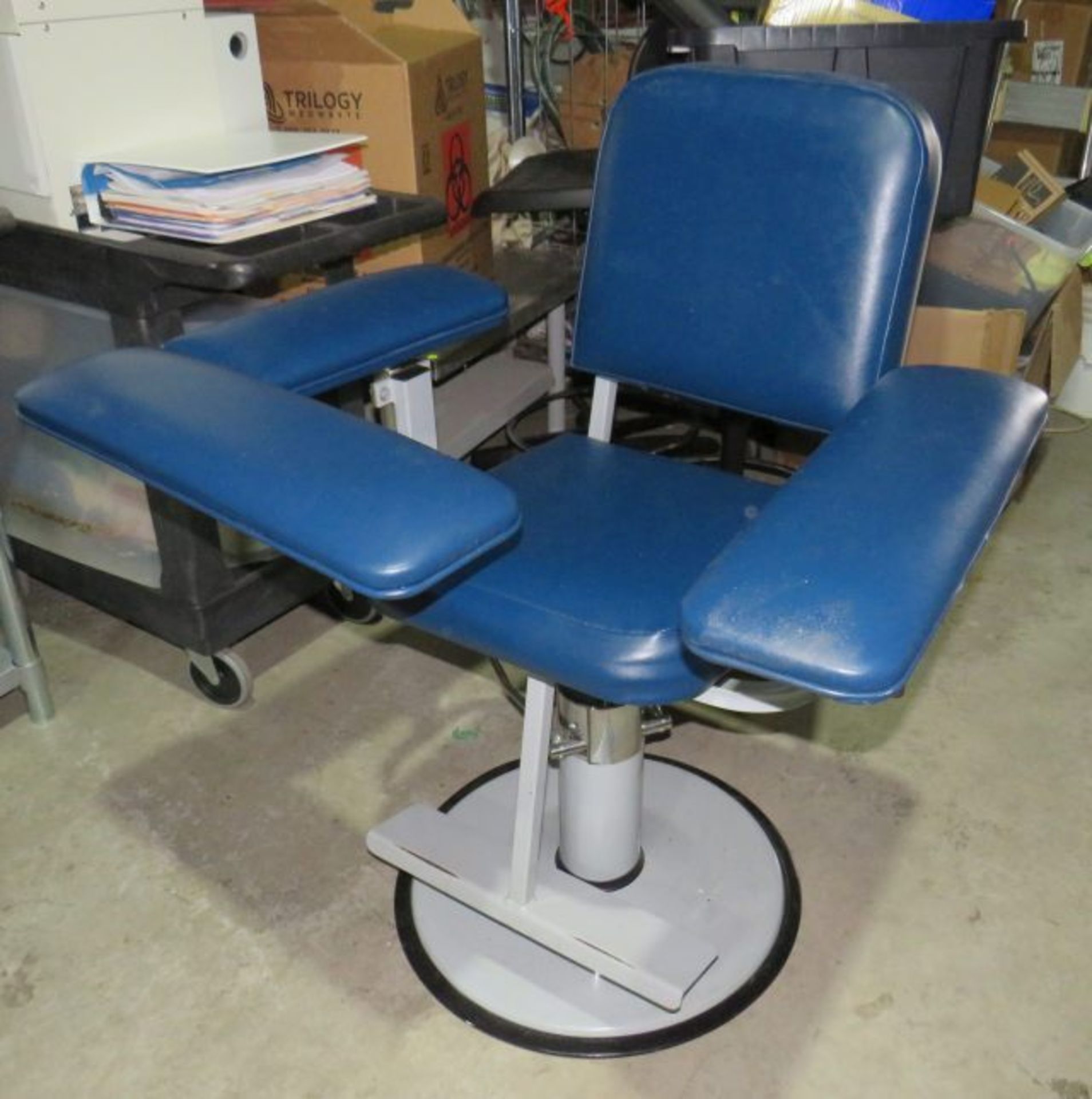Phlebotomy chair like new with hydraulic height adjustment and swivel chair, adjustable height ar...