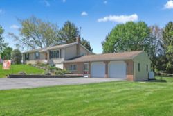 3 BED 1 BATH RAISED RANCHER & OUTBUILDINGS ON 1.11 +/- ACRE LOT