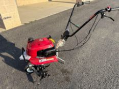Honda rear tine tiller.