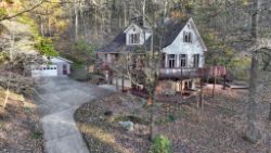 4 BED, 2½ BATH HOUSE W/DETACHED GARAGE ON 12.6 +/- AC WOODED LOT