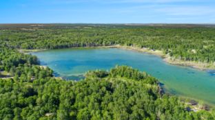 Invest in 3 Buildable Lots in Lakes of the North, MI!