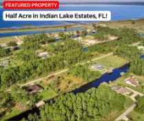 Half Acre in Central Florida's Premier Lakeside Community!