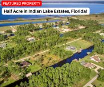 Half Acre in Central Florida's Premier Lakeside Community!