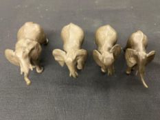 Group of 4 Descending Bronze Elephant Sculptures