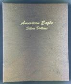 American Eagle Silver Dollar Collector's Binder with 19 Silver Dollars