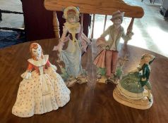Group of 4 Porcelain Figurines