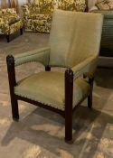 Vintage Upholstered Chair with Carved Wooden Arms and Legs