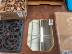 SMALL GILT OCTAGONAL WALL MIRROR
