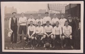 Football postcard, Rotherham County FC, photographic card showing team line up in goal mouth circa