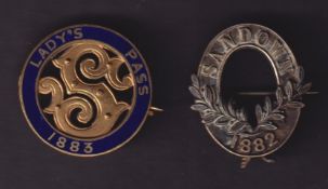Sandown Park, two badges, oval shaped metal ladies annual members badge for 1882 with laurel