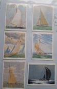 Cigarette Cards, a collection 12 sets in modern album, all Shipping and Boat related. Includes
