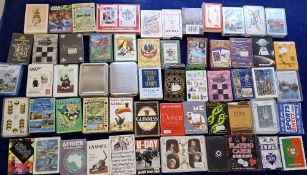 Playing cards, 56 packs of playing cards, many with advertisement backs, apparently complete (many
