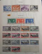 Stamps, KGVI Commonwealth mint and used collection housed in a Gibbons hingeless album. Excellent