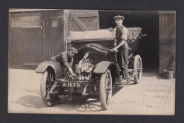 Postcard, Motoring, scarce RP, working on car engine, plate A1679 (vg)