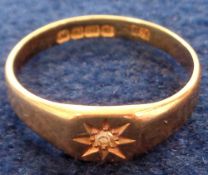 Jewellery, an 18ct gold ring with small central diamond approx. weight 2.85g