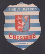 Trade card, J. Briggs, shield shaped card, 'Finely passed Cheshire County' (Baines rubber stamp mark