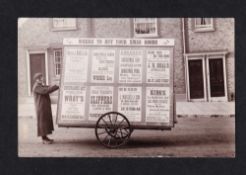Postcard, Advertising, RP, unusual Advert Board on wheels, with 8 posters for various shops,