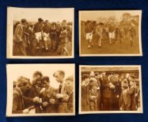 Football press photographs, four b/w press photos showing England players with fans & signing