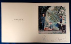 Royalty, a 1957 Christmas card signed Elizabeth R and Philip (overall size approx. 8.75 x 9.25