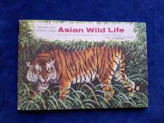 Trade cards, Brooke Bond Rhodesia, Asian Wildlife, empty album, (corner hinges stuck in the album,