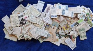 Cigarette cards, a few hundred cards, mainly in low grade condition, but very high catalogue