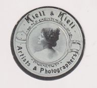 Trade card, Miell & Miell, Bournemouth, circular bookmark card with image of beauty to centre (