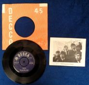 Autographs, The Rolling Stones, a b/w printed image of The Rolling Stones signed by Mick Jagger,