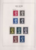 Stamps, GB QEII mint collection in a Stanley Gibbons hingeless album and a Devon album, 1970-1995 to