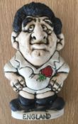 Rugby Union, a John Hughes Pottery Grogg showing England No 8, 19cm tall and signed to base by