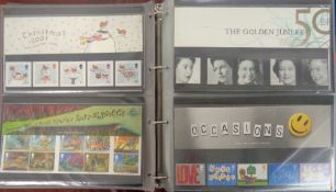 Stamps, GB QEII collection of Presentation packs together with a 1997 Royal mail stamp album, housed