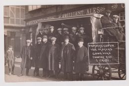 Football postcard, Portsmouth FC, a b/w photographic card showing players and officials in