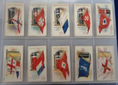 Cigarette cards, an album containing 15, mostly Shipping related, sets inc. Ogden's Flags &