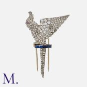 A Diamond Brooch in white gold, designed as a cockatoo set with round and rose cut diamonds with a