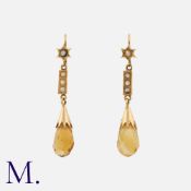 A Pair Of Citrine And Pearl Earrings in yellow gold, each set with a priolette cut citrine, accented