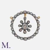 A Georgian Rose Diamond Pendant in silver and gold backs, with rose diamonds in cut down settings.